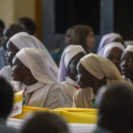 
              Nuns wait for the arrival of Pope Francis for a meeting with priests, deacons, consecrated people and seminarians at the Cathedral of Saint Theresa in Juba, South Sudan, Saturday, Feb. 4, 2023. Francis is in South Sudan on the second leg of a six-day trip that started in Congo, hoping to bring comfort and encouragement to two countries that have been riven by poverty, conflicts and what he calls a "colonialist mentality" that has exploited Africa for centuries. (AP Photo/Gregorio Borgia)
            