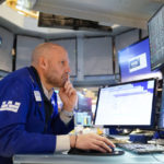 
              Traders work on the floor at the New York Stock Exchange in New York, Wednesday, Feb. 22, 2023. (AP Photo/Seth Wenig)
            