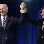 
              President Joe Biden and Vice President Kamala Harris stand on stage at the Democratic National Committee winter meeting, Friday, Feb. 3, 2023, in Philadelphia. (AP Photo/Patrick Semansky)
            