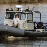 
              A Navy boat navigates the InterCoastal Waterway in North Myrtle Beach, S.C., Tuesday, Feb. 7, 2023.  Using underwater drones, warships and inflatable vessels, the Navy is carrying out an extensive operation to gather all of the pieces of the massive Chinese spy balloon a U.S. fighter jet shot down off the coast of South Carolina on Saturday.  (AP Photo/Nell Redmond)
            