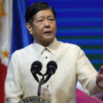 
              FILE - Philippine President Ferdinand Marcos Jr. gestures during his speech at the 2022 Department of Environment and Natural Resources Multi-stakeholder Forum in Manila, Philippines, on Oct. 5, 2022. Marcos and Japan’s Prime Minister Fumio Kishida are expected to sign key agreements to boost their defense ties Thursday, Feb. 9, 2023, as Asia sees tensions around China’s growing influence. (AP Photo/Aaron Favila, File)
            