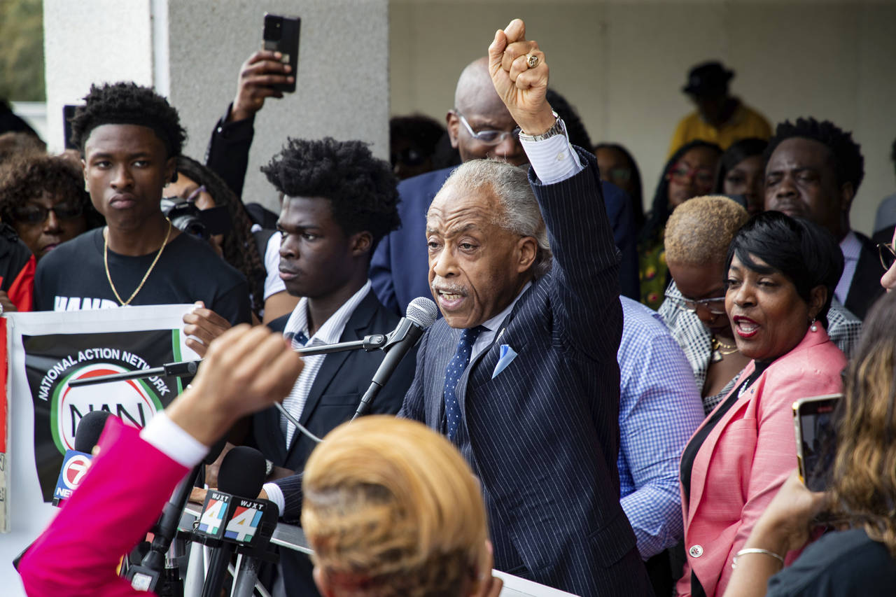 The Rev. Al Sharpton speaks to a crowd of hundreds from the steps of the Senate portico during the ...