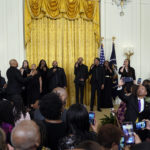
              Anthony Brown and group therAPy perform "Lift Every Voice and Sing" during an event with President Joe Biden to celebrate Black History Month, Monday, Feb. 27, 2023, in the East Room of the White House in Washington. (AP Photo/Alex Brandon)
            