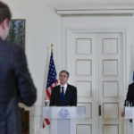 
              A journalist asks a question during a joint news conference of US Secretary of State Antony Blinken, left, and Greece's Foreign Minister Nikos Dendias, in Athens, Greece, on Tuesday, Feb. 21, 2023. Blinken is on a two-day trip in Athens, after his visit to Turkey, to meet with the country's leadership and launch the fourth round of the US-Greece Strategic Dialogue. (AP Photo/Michael Varaklas, Pool)
            