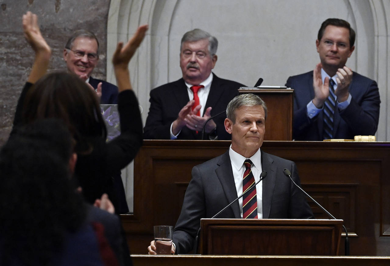 Legislators applaud Tennessee Gov. Bill Lee as he delivers his State of the State Address in the Ho...