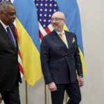 United States Secretary of Defense Lloyd Austin, left, and Ukraine's Defense Minister Kyrylo Budanov pose for the media prior to a meeting on the sidelines of a NATO defense ministers meeting at NATO headquarters in Brussels, Tuesday, Feb. 14, 2023. (AP Photo/Olivier Matthys, Pool)