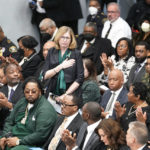
              Teresa K. Woodruff, Michigan State University interim President stands at the funeral for shooting victim Arielle Anderson in Detroit, Tuesday, Feb. 21, 2023. Anderson, Alexandria Verner and Brian Fraser and were killed and several other students injured after a gunman opened fire on the campus of Michigan State University. (AP Photo/Paul Sancya)
            