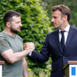 
              FILE - Ukrainian President Volodymyr Zelenskyy shakes hands with French President Emmanuel Macron during a press conference in Kyiv, Thursday, June 16, 2022. (Ludovic Marin, Pool via AP, File)
            