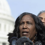 
              Congressional Black Caucus Chairman Rep. Steven Horsford, D-Nev., rear, looks on while RowVaughn Wells, left, mother of Tyre Nichols, who died after being beaten by Memphis police officers, speaks with reporters about police reform, on Capitol Hill in Washington, Tuesday, Feb. 7, 2023. (AP Photo/Cliff Owen)
            