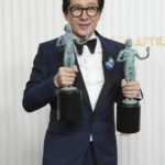 
              Ke Huy Quan, winner of the award for outstanding performance by a male actor in a supporting role and outstanding performance by a cast in a motion picture for "Everything Everywhere All at Once," poses in the press room at the 29th annual Screen Actors Guild Awards on Sunday, Feb. 26, 2023, at the Fairmont Century Plaza in Los Angeles. (Photo by Jordan Strauss/Invision/AP)
            