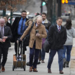 
              Michael J. Allen, front right, district attorney for Colorado's Fourth Judicial District, leads a contingent of attorneys into the El Paso County courthouse for a preliminary hearing for the alleged shooter in the Club Q mass shooting Wednesday, Feb. 22, 2023, in Colorado Springs, Colo. (AP Photo/David Zalubowski)
            