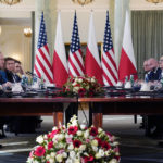 
              President Joe Biden, left, and Polish President Andrzej Duda, right, meet Tuesday, Feb. 21, 2023, in Warsaw. (AP Photo/ Evan Vucci)
            