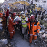 
              Rescue workers and medics pull out a person from a collapsed building in Antakya, Turkey, Wednesday, Feb. 15, 2023. More than 35,000 people have died in Turkey as a result of last week's earthquake, making it the deadliest such disaster since the country's founding 100 years ago. (Ugur Yildirim/DIA via AP)
            