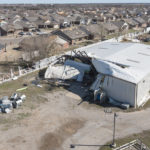 
              A drone photo of homes damaged along Frost Lane on Monday, Feb. 27, 2023 in Norman, Okla. The damage came after rare severe storms and tornadoes moved through Oklahoma overnight. (AP Photo/Alonzo Adams)
            
