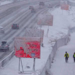 
              Runners negotiate snow covered paths along Interstate 80 in Salt Lake City, Utah., on Wednesday, Feb. 22, 2023. Brutal winter weather hammered the northern U.S. Wednesday with “whiteout” snow, dangerous wind gusts and bitter cold, shutting down roadways, closing schools and businesses and prompting dire warnings for people to stay home.  (Francisco Kjolseth /The Salt Lake Tribune via AP)
            