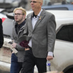 
              Michael Anderson, a survivor of the mass shooting at Club Q, back, walks with the club's co-owner, Matthew Haynes, into the El Paso County courthouse for a preliminary hearing for Anderson Lee Aldrich,  the alleged shooter in the Club Q mass shooting Wednesday, Feb. 22, 2023, in Colorado Springs, Colo. (AP Photo/David Zalubowski)
            
