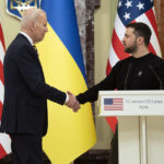 
              US President Joe Biden, left, shakes hands with Ukrainian President Volodymyr Zelenskyy after they both delivered statements at Mariinsky Palace during an unannounced visit, in Kyiv, Ukraine, Monday, Feb. 20, 2023. (AP Photo/Evan Vucci)
            