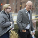 
              Michael Anderson, left, a survivor of the mass shooting at Club Q, walks with the club's co-owner, Matthew Haynes, into the El Paso County courthouse for a preliminary hearing for Anderson Lee Aldrich, the alleged shooter in the Club Q mass shooting Wednesday, Feb. 22, 2023, in Colorado Springs, Colo. (AP Photo/David Zalubowski)
            