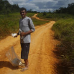 
              Miner Joao Batista Costa, 61, walks for days to leave the Yanomami Indigenous territory ahead of expected operations against illegal mining in Alto Alegre, Roraima state, Brazil, Tuesday, Feb. 7, 2023. The government declared a public health emergency for the Yanomami people in the Amazon, who are suffering from malnutrition and diseases such as malaria as a consequence of illegal mining. Costa, told reporters the Yanomami are dying of hunger and that the recent emergency shipment of food has not been enough. (AP Photo/Edmar Barros)
            