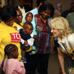 
              U.S. First Lady Jill Biden, right, reacts during a visit to a U.S. President's Emergency Plan for AIDS Relief (PEPFAR) project at an informal settlement near Windhoek, Namibia, Thursday, Feb. 23, 2023. The First Lady is on a five-day visit to Africa as part of President Biden's commitment to deepen engagement with African nations. (AP Photo/Dirk Heinrich)
            