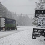 
              Eastbound Highway 50 requires chains on vehicles as snow falls in Pollock Pines, Calif., Tuesday, Feb. 28, 2023. (Salgu Wissmath/San Francisco Chronicle via AP)
            