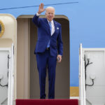 
              President Joe Biden waves as he boards Air Force One at Andrews Air Force Base, Md., Thursday, Feb. 9, 2023, en route to Florida. (AP Photo/Jess Rapfogel)
            