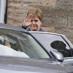 Scotland's First Minister Nicola Sturgeon leaves Bute House after she announced that she will stand down as First Minister for Scotland, in Edinburgh, Wednesday, Feb. 15, 2023. Sturgeon has announced her intention to resign. Sturgeon, who has led the country's devolved government and the Scottish National Party for eight years told a news conference Wednesday at her official residence, Bute House in Edinburgh, that part of serving in politics is knowing when it is time to make way for someone else. (Andrew Milligan/PA via AP)