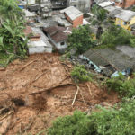 
              Mud covers an area after flooding triggered deadly landslides near Juquehy beach in Sao Sebastiao, Brazil, Monday, Feb. 20, 2023. (AP Photo/Andre Penner)
            