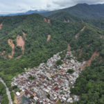 
              The community near Barra do Sahi beach after deadly landslides were triggered by heavy rain in the coastal city of Sao Sebastiao, Brazil, Wednesday, Feb. 22, 2023. (AP Photo/Andre Penner)
            