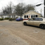 
              A motorist drives through a neighborhood that could someday be patrolled by the state-run Capitol Police in Jackson, Miss., Feb. 21, 2023. A proposal being considered by the majority-white Mississippi Legislature would expand the patrol territory for Capitol Police within the majority-Black capital city of Jackson, but many residents and officials say this would infringe on the rights of local people to run their own government. (AP Photo/Rogelio V. Solis)
            