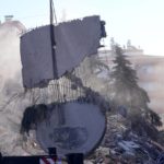 
              A crane removes debris as rescuers search on a destroyed building in Gaziantep, southeastern Turkey, Thursday, Feb. 9, 2023. The Turkish government has for years tempted fate by not enforcing modern construction codes at the same time it was allowing — and in some cases, encouraging — a real estate boom in earthquake-prone areas, according to experts in geology and engineering who repeatedly issued warnings. (AP Photo/Kamran Jebreili)
            