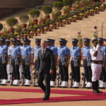 
              German Chancellor Olaf Scholz, inspects a joint military guard of honour during his ceremonial reception at the Indian presidential palace in New Delhi, India, Saturday, Feb. 25, 2023. (AP Photo/Manish Swarup)
            