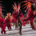 
              Performers from the Imperatriz Leopoldinense samba school parade on a float during Carnival celebrations at the Sambadrome in Rio de Janeiro, Brazil, Tuesday, Feb. 21, 2023. (AP Photo/Bruna Prado)
            