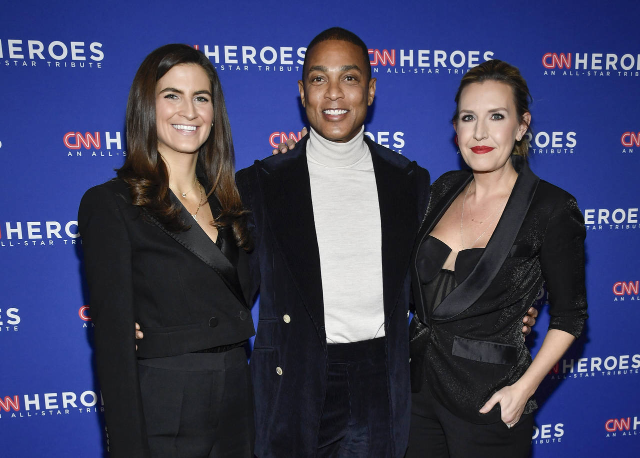 FILE - CNN anchors Kaitlan Collins, from left, Don Lemon and Poppy Harlow appear at the 16th annual...