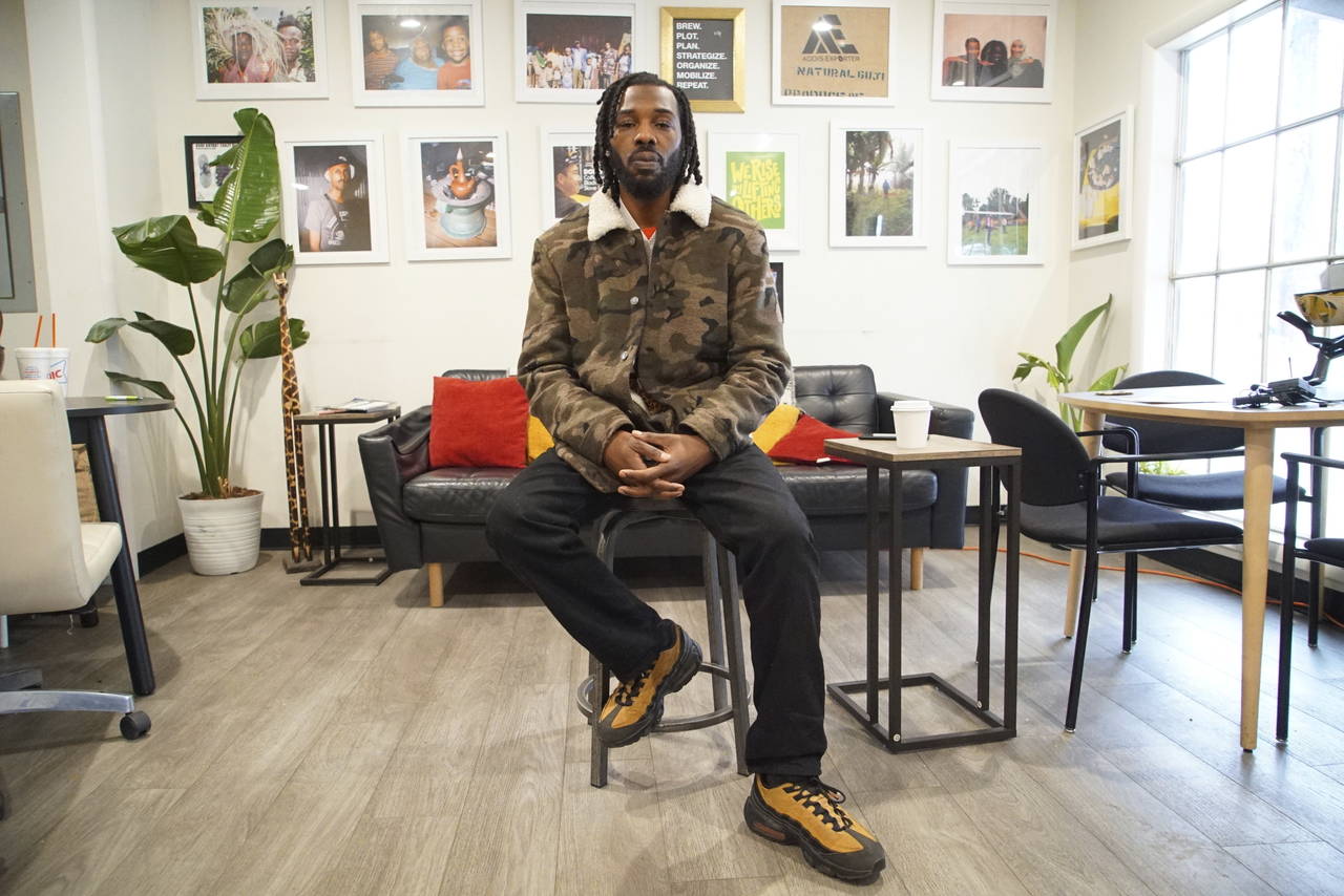 Community organizer Chase Madkins poses for a portrait in a Black-owned coffee shop in Memphis, Ten...