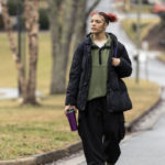 
              Kailani Taylor-Cribb walks through her neighborhood in Asheville, N.C., on Tuesday, Jan. 31, 2023. Kailani hasn’t taken a single class in what used to be her high school since the height of the coronavirus pandemic. She vanished from the public school roll in Cambridge, Mass., in 2021 and has been, from an administrative standpoint, unaccounted for since then. (AP Photo/Kathy Kmonicek)
            