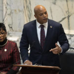 
              Maryland House Speaker Adrienne Jones, left, looks on as Gov. Wes Moore delivers his first state of the state address, two weeks after being sworn as governor, Wednesday, Feb. 1, 2023, in Annapolis, Md. (AP Photo/Julio Cortez)
            