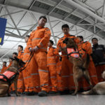 
              South Korean rescue team members prepare to board a plane to leave for quake-ravaged Turkey at the Incheon International Airport in Incheon, South Korea, Tuesday, Feb. 7, 2023. (AP Photo/(AP Photo/Ahn Young-joon)
            