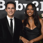 
              FILE - Juan David Borrero, left, and Jasmine Tookes arrive at the 2022 Baby2Baby Gala in West Hollywood, Calif., on Nov. 12, 2022. Tookes announced her pregnancy on Instagram on Nov. 22. (Photo by Jordan Strauss/Invision/AP, File)
            
