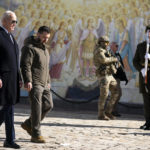 
              US President Joe Biden, left, walks with Ukrainian President Volodymyr Zelenskyy at St. Michaels Golden-Domed Cathedral during an unannounced visit, in Kyiv, Ukraine, Monday, Feb. 20, 2023. (AP Photo/Evan Vucci)
            