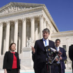 
              Nebraska Attorney General Mike Hilgers speaks with reporters outside the Supreme Court on Capitol Hill in Washington, Tuesday, Feb. 28, 2023, after the court heard arguments over President Joe Biden's student debt relief plan. Standing behind Hilgers are Iowa Attorney General Brenna Bird, from left, Nebraska Solicitor General Jim Campbell and Missouri Attorney General Andrew Bailey. (AP Photo/Patrick Semansky)
            