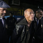 
              Weng Sor is walked by New York Police Department detectives out of the 68th Precinct in the Brooklyn borough of New York on Tuesday, Feb. 14, 2023. Sor was charged Tuesday with murder and attempted murder after he went on a deadly rampage with a U-Haul truck a day earlier in New York City. (AP Photo/Stefan Jeremiah)
            