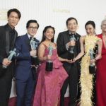 
              Harry Shum Jr., from left, Ke Huy Quan, Stephanie Hsu, Michelle Yeoh and Jamie Lee Curtis pose in the press room with the award for outstanding performance by a cast in a motion picture for "Everything Everywhere All at Once," at the 29th annual Screen Actors Guild Awards on Sunday, Feb. 26, 2023, at the Fairmont Century Plaza in Los Angeles. (Photo by Jordan Strauss/Invision/AP)
            