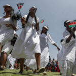 
              Kenyans attend a national day of prayer event held at Nyayo stadium in the capital Nairobi, Kenya, Tuesday, Feb. 14, 2023. With the prospect of a sixth consecutive failed rainy season in the east and Horn of Africa, Kenya's president is hoping the heavens will finally open with the help of a national day of mass prayer. (AP Photo/Brian Inganga)
            