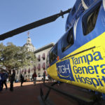 
              Visitors check out Tampa General Hospital's helicopter during "We Are TGH Day" Wednesday, Feb. 8, 2023 at the Capitol in Tallahassee, Fla. (AP Photo/Phil Sears)
            