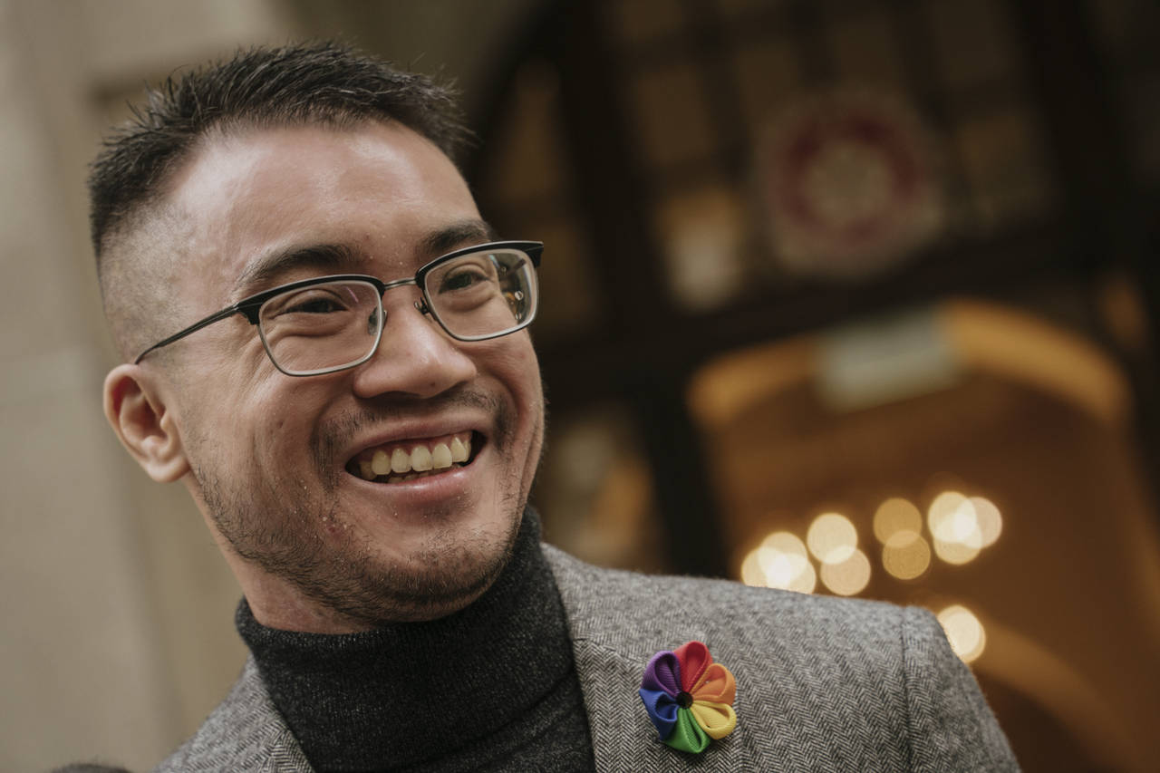 Transgender activist Henry Edward Tse speaks to reporters outside of Court of Final Appeal in Hong ...