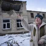 
              Valentyna Mozgova, 55, lab medic gestures as she talks at a hospital which was damaged by Russian shelling in Krasnohorivka, Ukraine, Sunday, Feb. 19, 2023. (AP Photo/Evgeniy Maloletka)
            