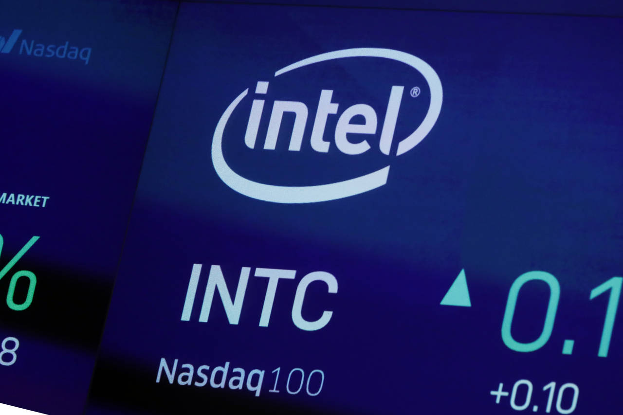 FILE - The symbol for Intel appears on a screen at the Nasdaq MarketSite in New York, Oct. 1, 2019....