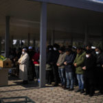 
              Men pray during the funeral of two people killed during the earthquake at Sehir cemetery in Malatya, Turkey, Sunday, Feb. 12, 2023. Five days after two powerful earthquakes hours apart caused scores of buildings to collapse, killing thousands of people and leaving millions homeless, rescuers were still pulling unlikely survivors from the ruins. (AP Photo/Francisco Seco)
            