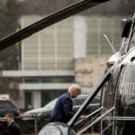 
              President Joe Biden boards Marine One after visiting Walter Reed National Military Medical Center in Bethesda, Md., Thursday, Feb. 16, 2023, to travel back to the White House. (AP Photo/Andrew Harnik)
            